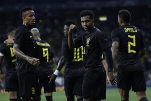 Vinícius and Brazil teammates wear black shirts in stand against racism