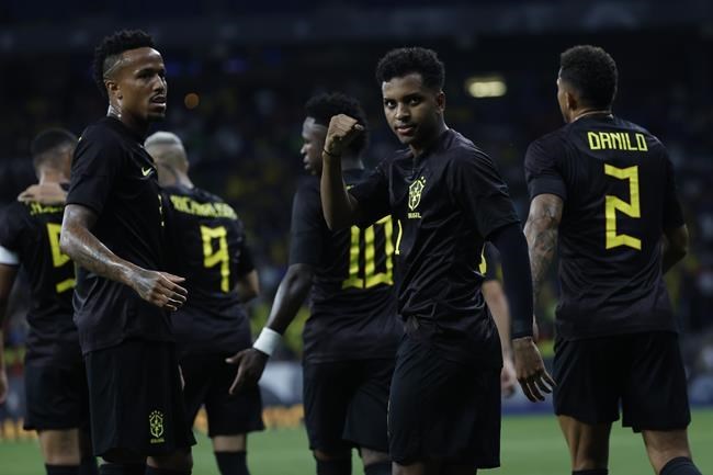 Vinícius and Brazil teammates wear black shirts in stand against racism